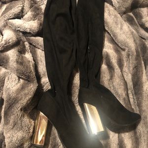 black tall high heel boots